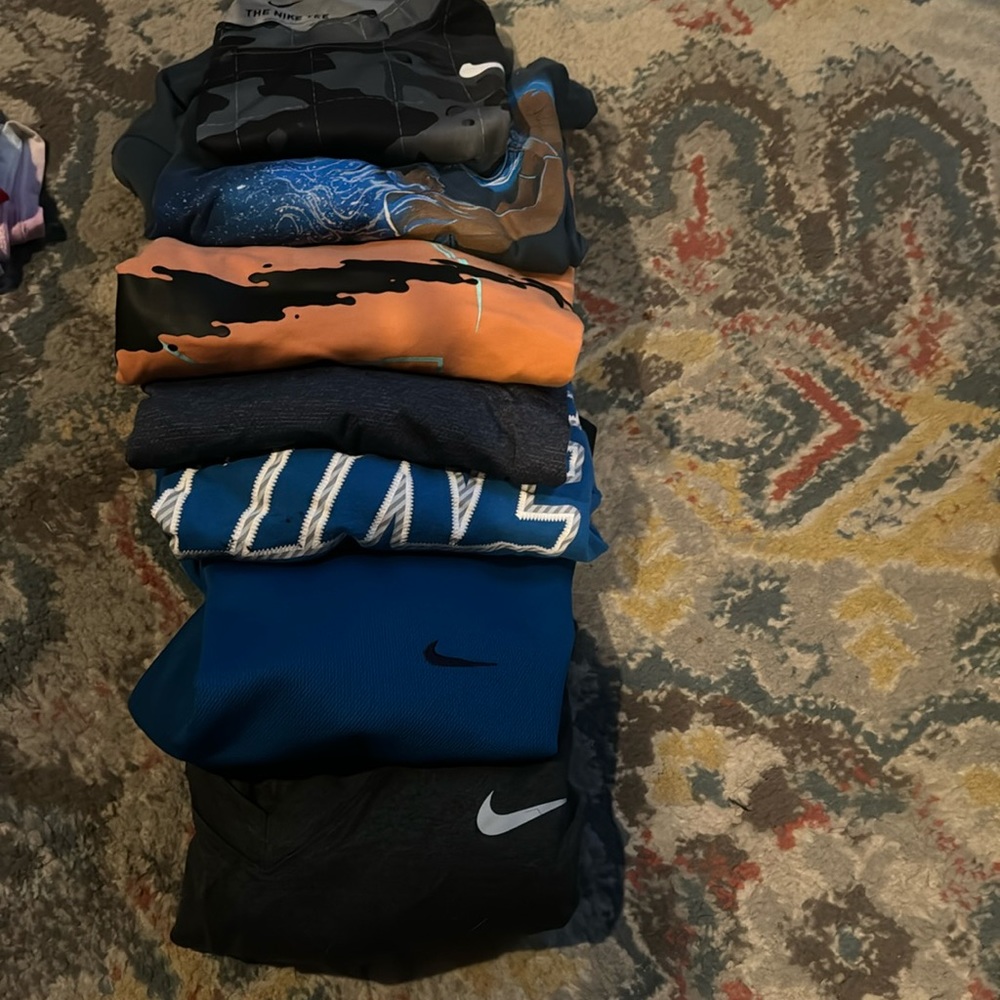 Small and medium Nike tees